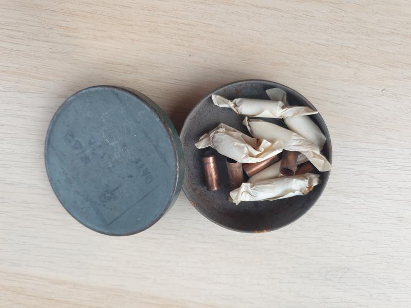 SOE tin with copper tube igniters.